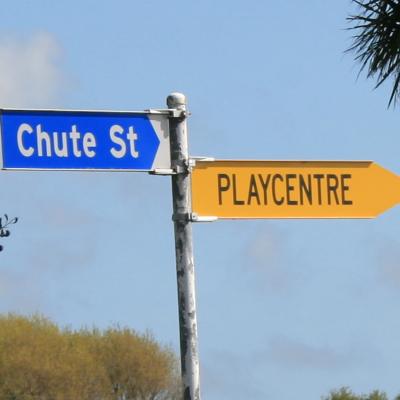 Street sign with Chute St and Playcentre in Normanby, NZ